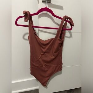 Pink Lily Mauve Body Suit